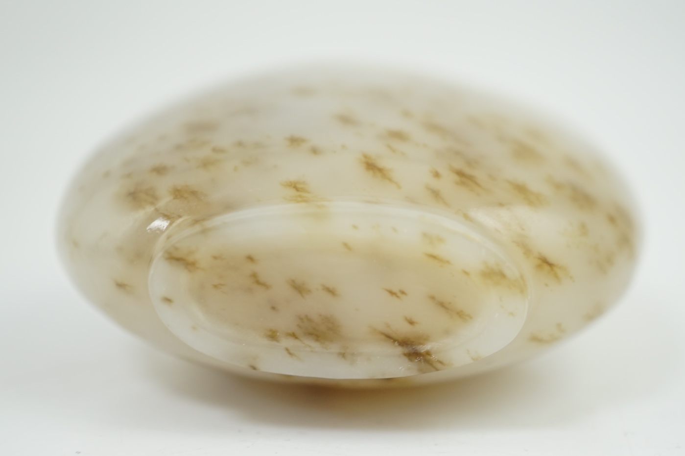 A Chinese white and russet mottled jade snuff bottle, 18th/19th century